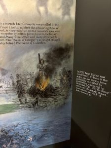Illustration depicting the execution of Janet Horne, alongside interpretation about Scotland's last recorded witchcraft execution at Historylinks Museum.